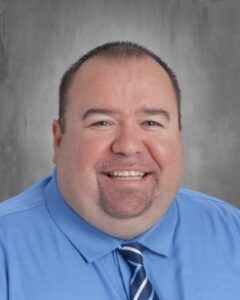 Seven Years Post RN Degree, David Price Finds His Sweet Spot: Health Coordinator For 2700 Students in a Medically Under-Served Community