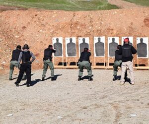 Fresno Criminal Justice Corrections students practice safe firearm handling