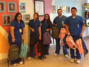 CAMA Club Donates Backpacks to Kids at Shelter