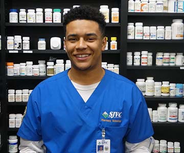 SJVC Pharmacy Technology Student in Blue Scrubs
